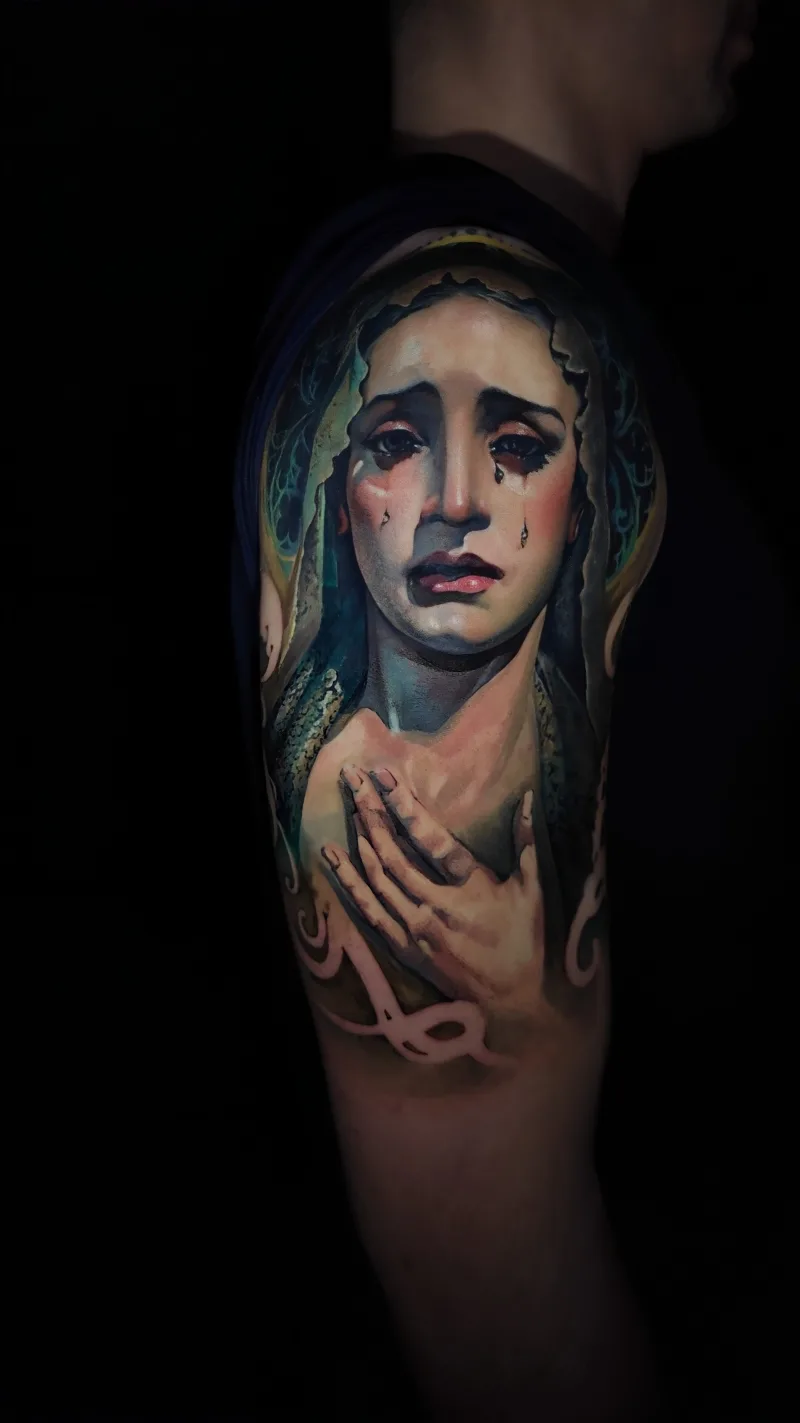 Crying woman colored arm shoulder tattoo done by Shang Qi Liu