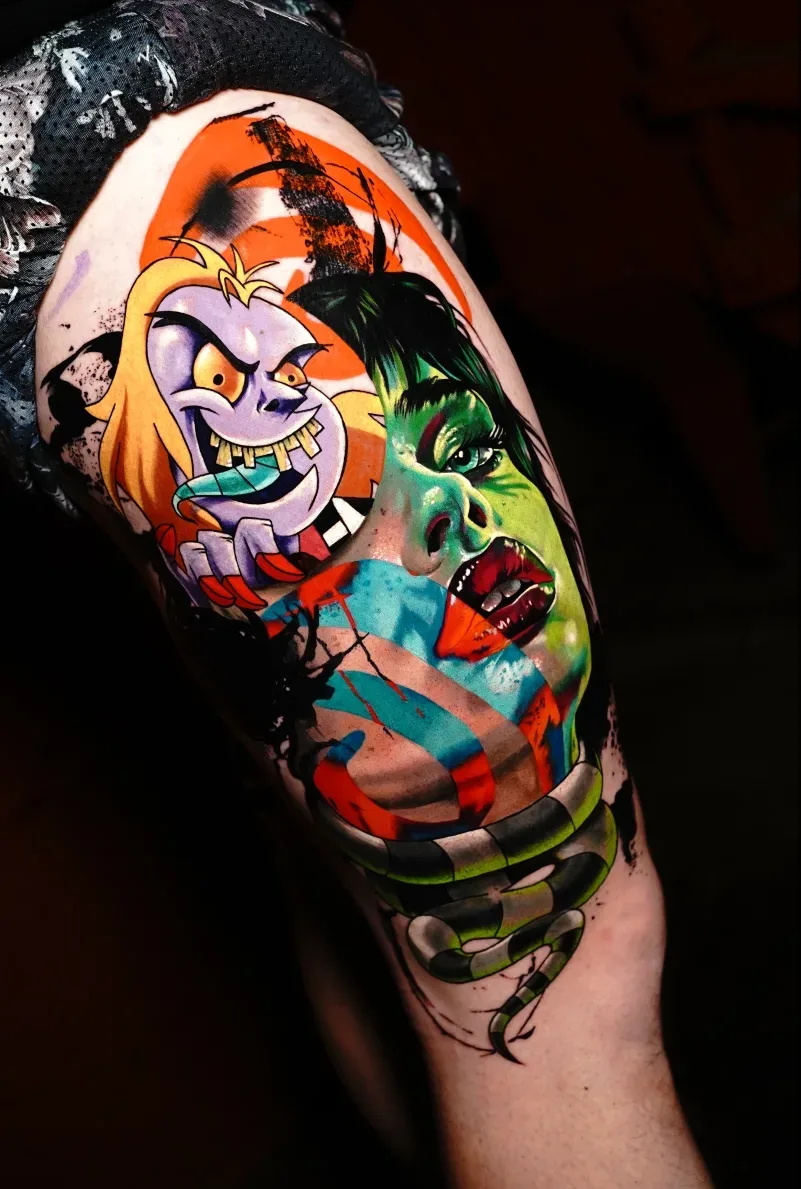 Lady monster snake thigh tattoo done by Ina Lutaric