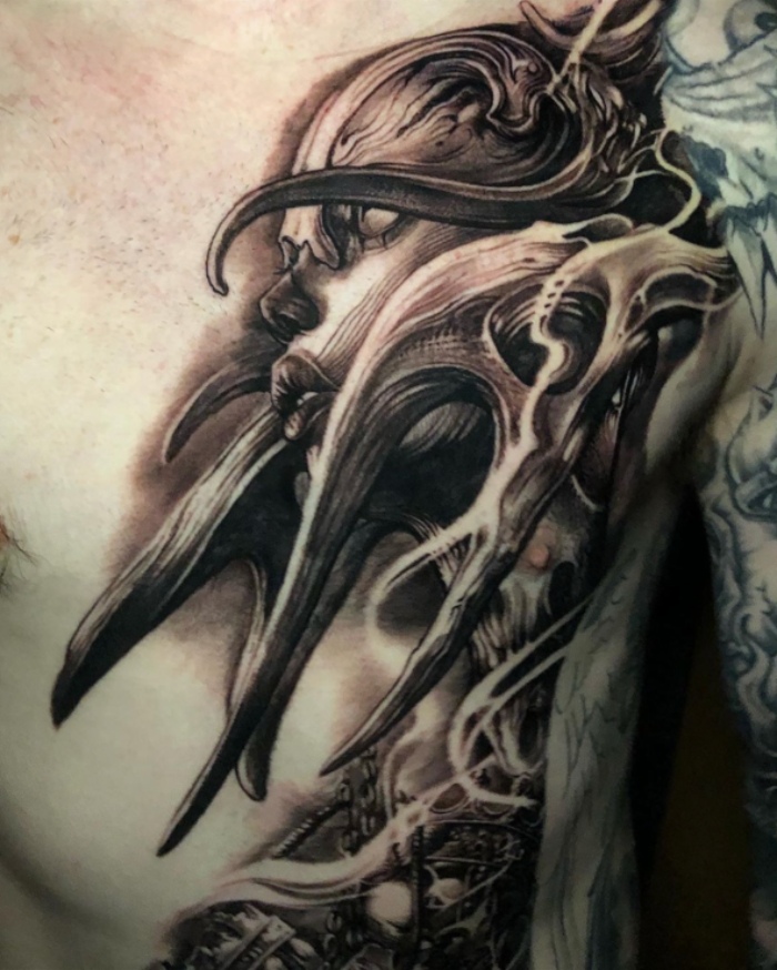 Carl Gace side tattoo