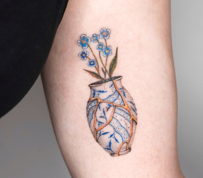 Carmine Abblasio • Crafting The Art of Miniature Tattoos Carmine Abblasio flower tattoo