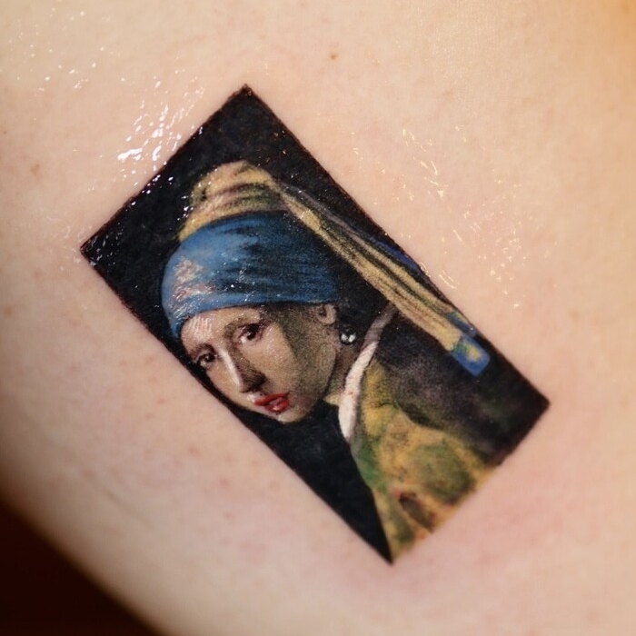 Carmine Abblasio • Crafting The Art of Miniature Tattoos Carmine Abblasio pearl tattoo