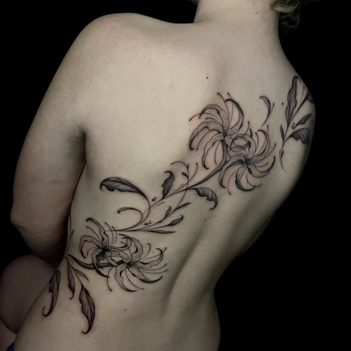 Mattia Provezza Interview flower on back tattoo